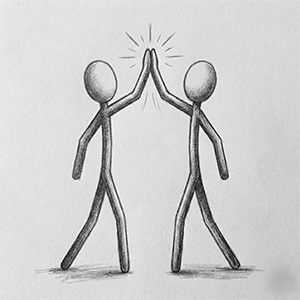 Zwei Menschen stehen sich begeistert gegenüber.